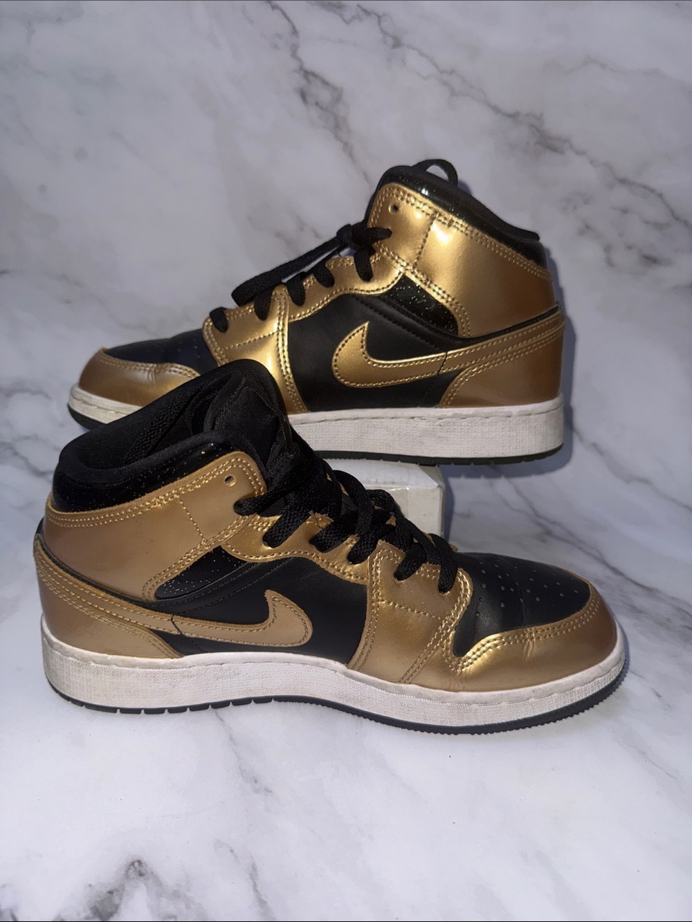 Nike Black and Metallic Gold Mid-Top Sneakers